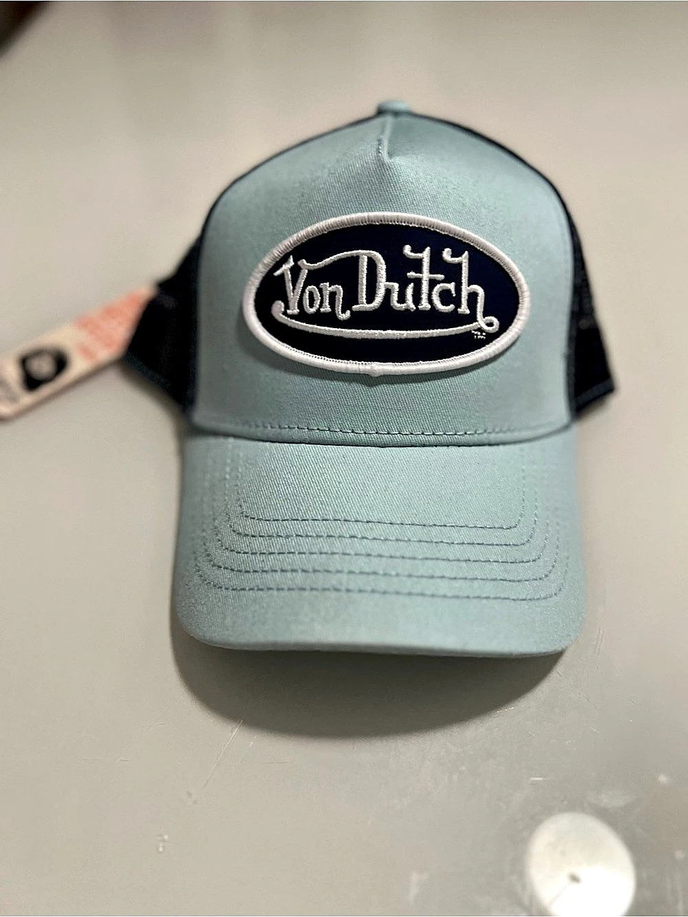 Von Dutch Oval Patch Trucker Hat in Blue & Black